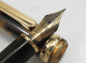 585 金 ｜東京都大田区まで出張買取で貴金属[K14 金 1g 3774円 万年筆 ペン先 585刻印 0.6g]